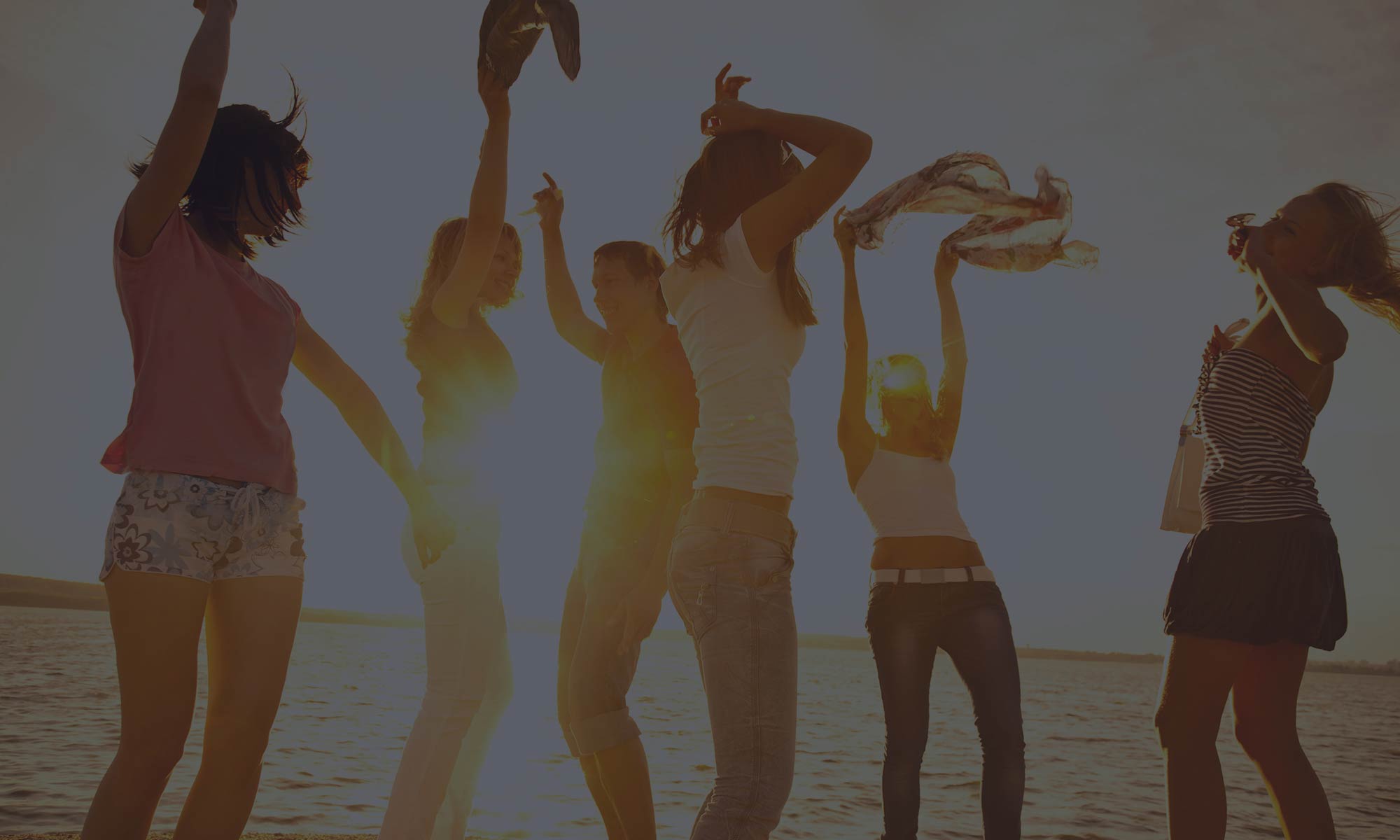 People Dancing on the Beach